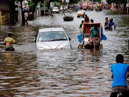 More than 130 dead in India as rains trigger floods, landslides