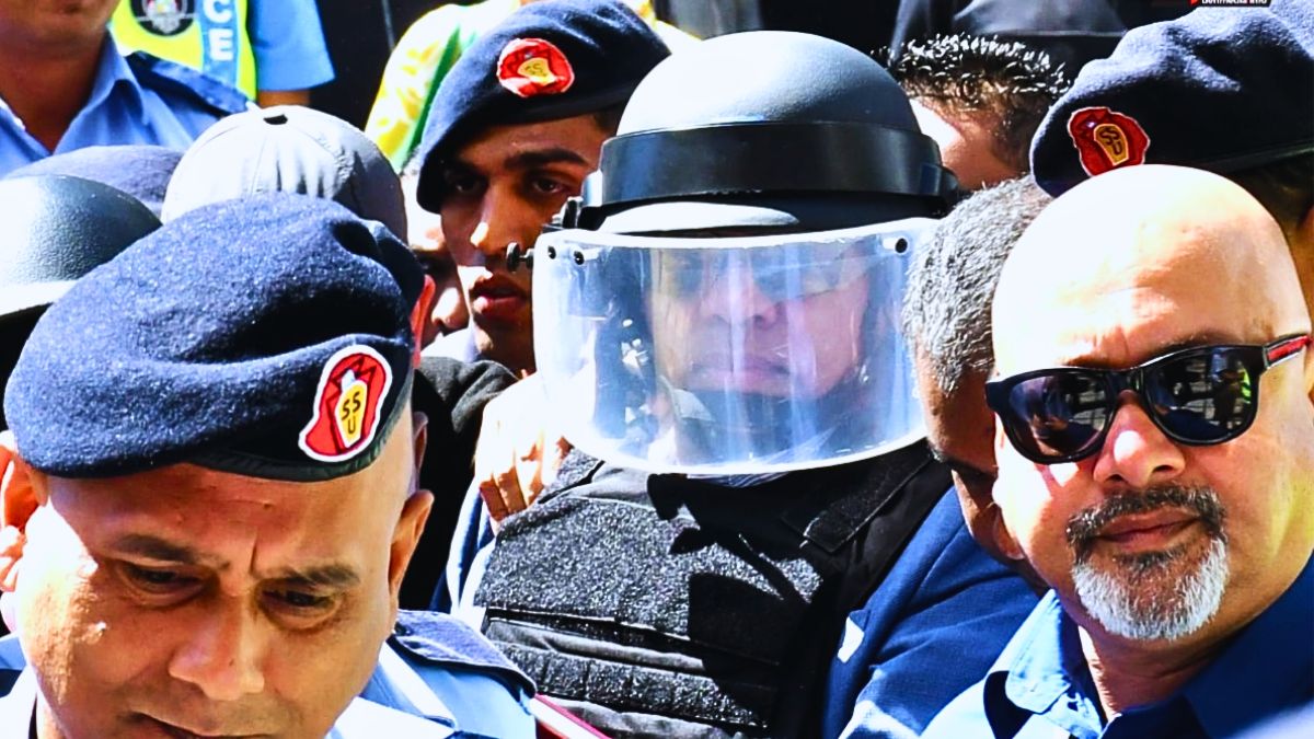Angry Crowd Jeers Disgraced Ex-Cop Charged in Rs17Million Fraud Scheme